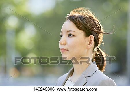 Young Japanese businesswoman outside View Large Photo Image Stock Photograph - Young Japanese businesswoman outside. Fotosearch