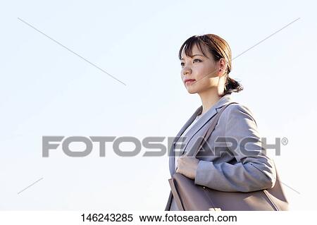 Young Japanese businesswoman outside View Large Photo Image Stock Photography - Young Japanese businesswoman outside. Fotosearch