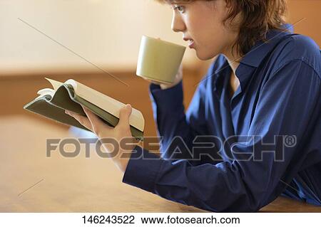 Young Japanese woman at a cafe View Large Photo Image Stock Image - Young Japanese woman at a cafe. Fotosearch