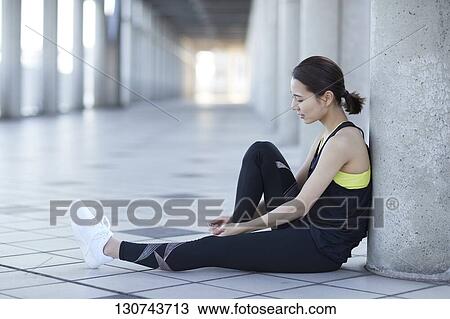 Young Japanese Woman Taking A Break During Jogging View Large Photo Image Stock Image - Young Japanese Woman Taking A Break During Jogging. Fotosearch