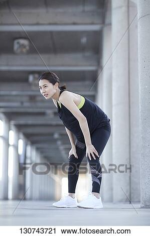 Young Japanese Woman Taking A Break During Jogging View Large Photo Image Stock Image - Young Japanese Woman Taking A Break During Jogging. Fotosearch