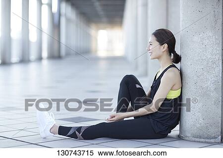 Young Japanese Woman Taking A Break During Jogging View Large Photo Image Stock Photography - Young Japanese Woman Taking A Break During Jogging. Fotosearch