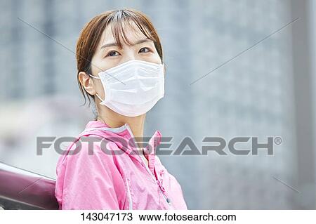 Young Japanese woman training downtown Tokyo View Large Photo Image Stock Image - Young Japanese woman training downtown Tokyo. Fotosearch