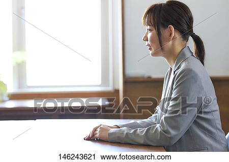 Young Japanese woman working View Large Photo Image Stock Image - Young Japanese woman working. Fotosearch