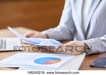 Stock Photo - Young Japanese woman working. Fotosearch