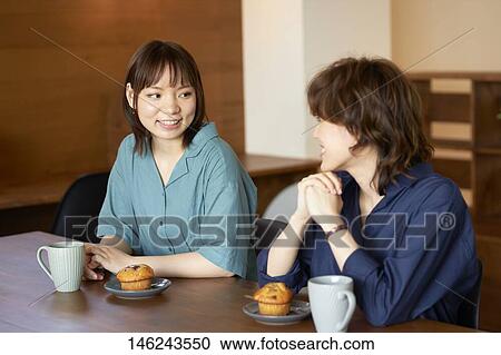 Young Japanese women at a cafe View Large Photo Image Stock Image - Young Japanese women at a cafe. Fotosearch