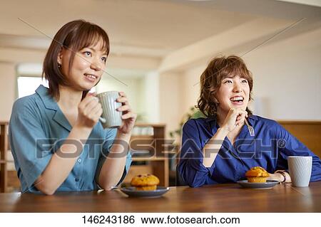 Young Japanese women at a cafe View Large Photo Image Stock Photograph - Young Japanese women at a cafe. Fotosearch