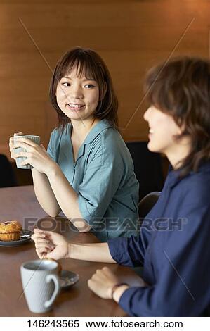 Young Japanese women at a cafe View Large Photo Image Stock Photography - Young Japanese women at a cafe. Fotosearch