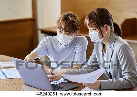 Young Japanese women working View Large Photo Image Stock Image - Young Japanese women working. Fotosearch