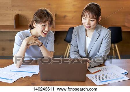 Young Japanese women working View Large Photo Image Stock Image - Young Japanese women working. Fotosearch