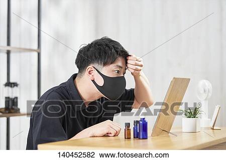 Young Man Checking His Face With A Mirror View Large Photo Image Stock Image - Young Man Checking His Face With A Mirror. Fotosearch