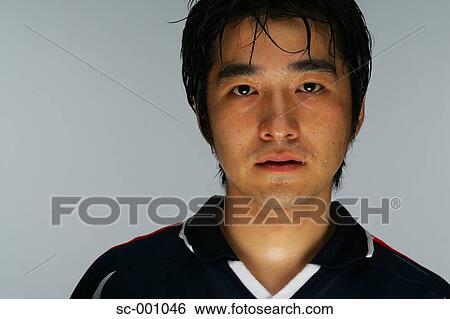 Stock Photograph - Perspiring soccer player. Fotosearch