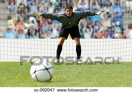 Stock Photo - Goalkeeper facing penalty. Fotosearch
