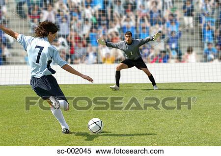 Stock Photography - Goalkeeper facing penalty. Fotosearch