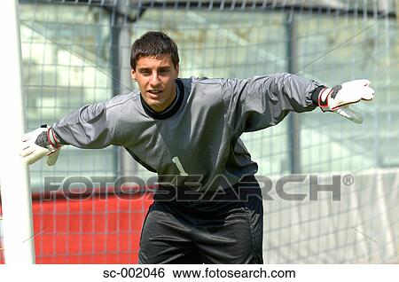 Goalkeeper lining up wall View Large Photo Image Stock Photograph - Goalkeeper lining up wall. Fotosearch