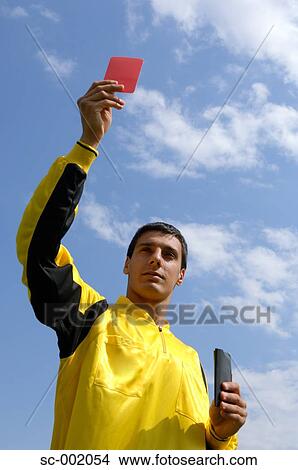 Referee showing red card View Large Photo Image Picture - Referee showing red card. Fotosearch