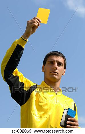 Referee showing yellow card View Large Photo Image Stock Image - Referee showing yellow card. Fotosearch