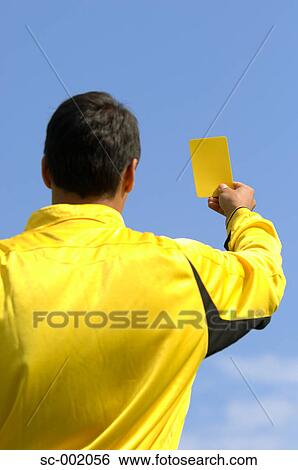 Referee showing yellow card View Large Photo Image Stock Photograph - Referee showing yellow card. Fotosearch