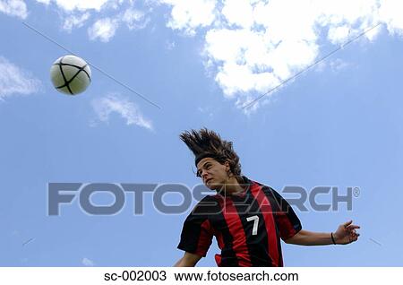 Soccer player heading ball View Large Photo Image Stock Image - Soccer player heading ball. Fotosearch
