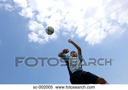 Soccer player heading ball View Large Photo Image Stock Photography - Soccer player heading ball. Fotosearch
