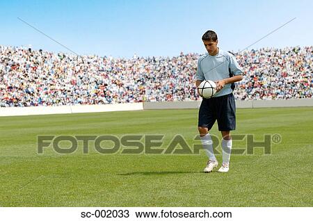 Soccer player lining up free-kick View Large Photo Image Stock Image - Soccer player lining up free-kick. Fotosearch