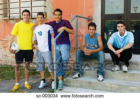 Group of teenage soccer friends on steps View Large Photo Image Picture - Group of teenage soccer friends on steps. Fotosearch