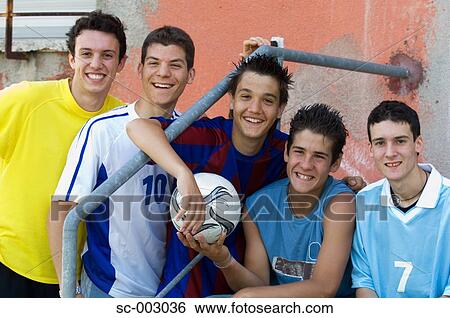 Group of teenage soccer friends on steps View Large Photo Image Stock Photograph - Group of teenage soccer friends on steps. Fotosearch