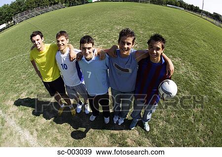 Stock Photo - Group of teenage soccer friends. Fotosearch
