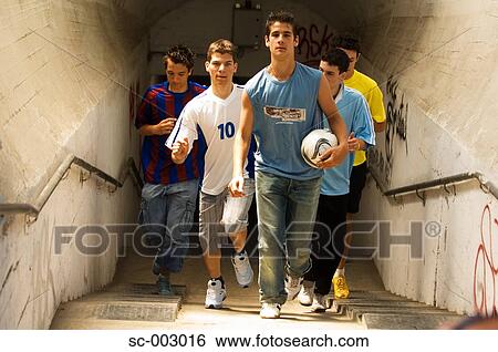 Street soccer team emerging from tunnel View Large Photo Image Stock Photograph - Street soccer team emerging from tunnel. Fotosearch