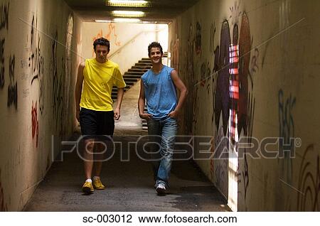 Teenage boys in underpass View Large Photo Image Stock Image - Teenage boys in underpass. Fotosearch