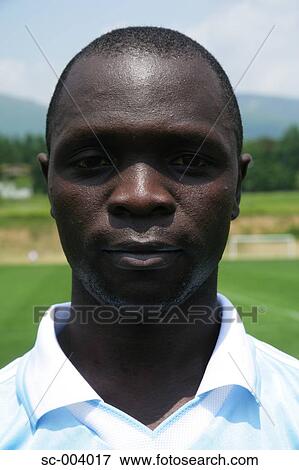 Stock Photo - Head shot of soccer player. Fotosearch
