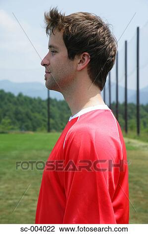 Side view of soccer player View Large Photo Image Stock Image - Side view of soccer player. Fotosearch