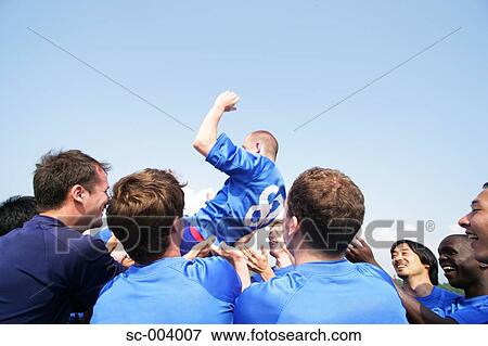 Soccer team celebrating View Large Photo Image Stock Photo - Soccer team celebrating. Fotosearch
