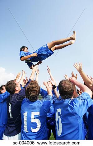 Soccer team celebrating View Large Photo Image Stock Photograph - Soccer team celebrating. Fotosearch