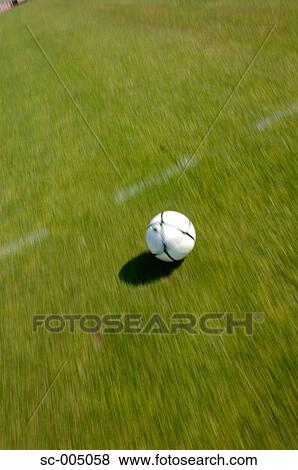 Blurred image of soccer ball in motion View Large Photo Image Stock Photo - Blurred image of soccer ball in motion. Fotosearch