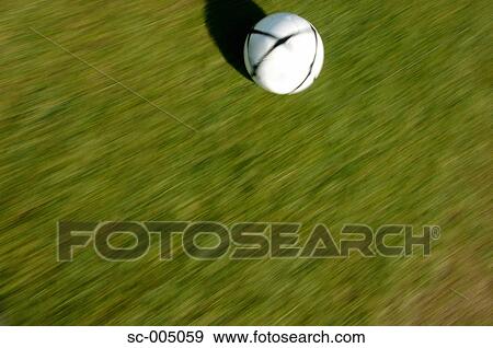Stock Photo - Blurred image of soccer ball in motion. Fotosearch