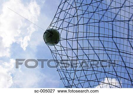Soccer ball hitting back of net View Large Photo Image Stock Photo - Soccer ball hitting back of net. Fotosearch
