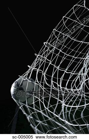 Soccer ball hitting back of net View Large Photo Image Stock Photography - Soccer ball hitting back of net. Fotosearch
