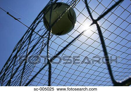 Soccer ball hitting back of net View Large Photo Image Stock Photography - Soccer ball hitting back of net. Fotosearch