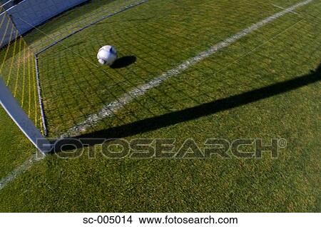 Picture - Soccer ball in goal. Fotosearch