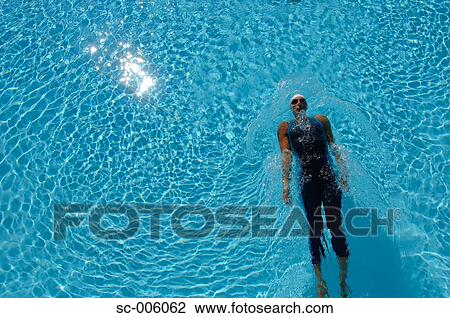 Bird's Eye View of Female Swimmer Gliding In Pool View Large Photo Image Stock Image - Bird's Eye View of Female Swimmer Gliding In Pool. Fotosearch