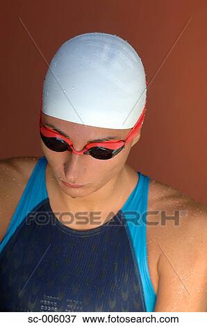 Stock Photo - Female Swimmer Sitting. Fotosearch