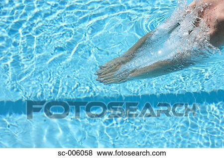 Stock Photo - Hands of Male Swimmer Diving. Fotosearch