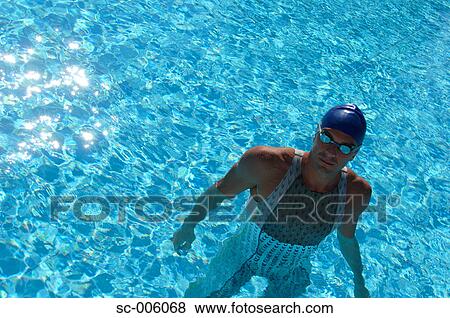 Male Swimmer Standing in Pool View Large Photo Image Stock Photo - Male Swimmer Standing in Pool. Fotosearch