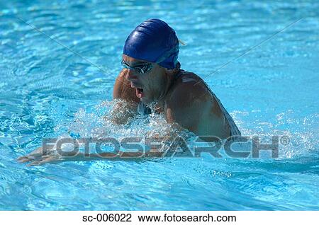 Stock Image - Male Swimmer Swimming Butterfly. Fotosearch