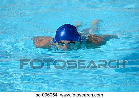 Picture - Male Swimmer Swimming Underwater. Fotosearch