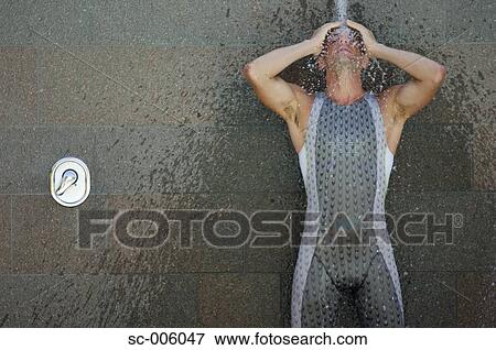 Male Swimmer Taking a Shower View Large Photo Image Stock Photo - Male Swimmer Taking a Shower. Fotosearch