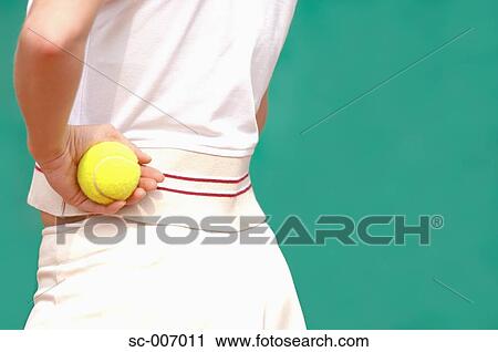 Close-Up of Female Tennis Player Holding Ball View Large Photo Image Stock Image - Close-Up of Female Tennis Player Holding Ball. Fotosearch