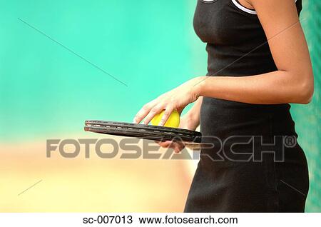 Close-Up of Female Tennis Player Holding Ball View Large Photo Image Stock Image - Close-Up of Female Tennis Player Holding Ball. Fotosearch