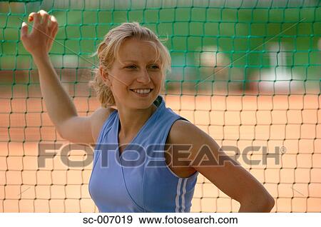 Female Tennis Player Holding Net View Large Photo Image Stock Photo - Female Tennis Player Holding Net. Fotosearch